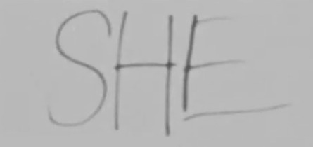 Она